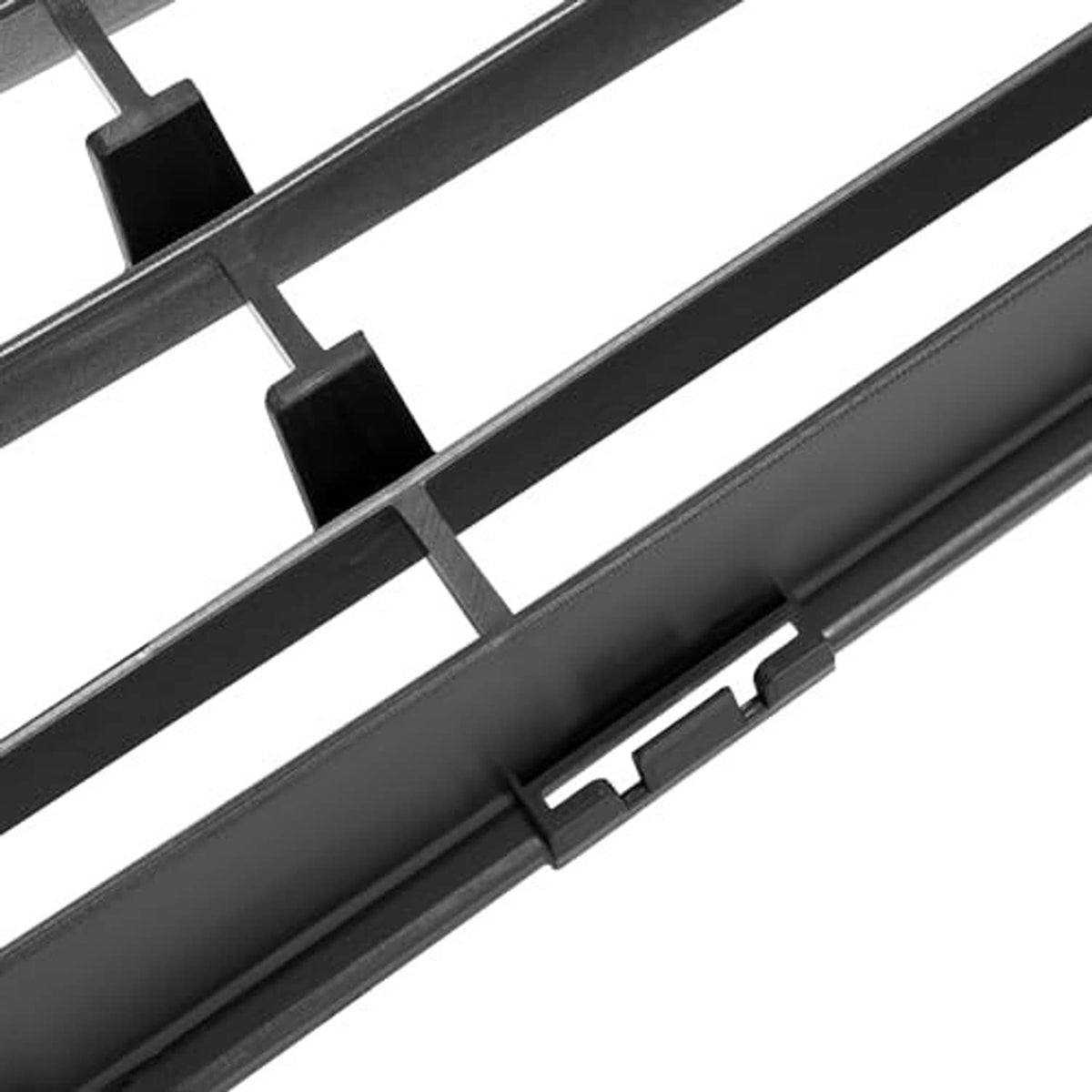 Close-up of black grille frame seams and bar supports