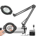 Black desk magnifier lamp with clamp and articulated swing arm