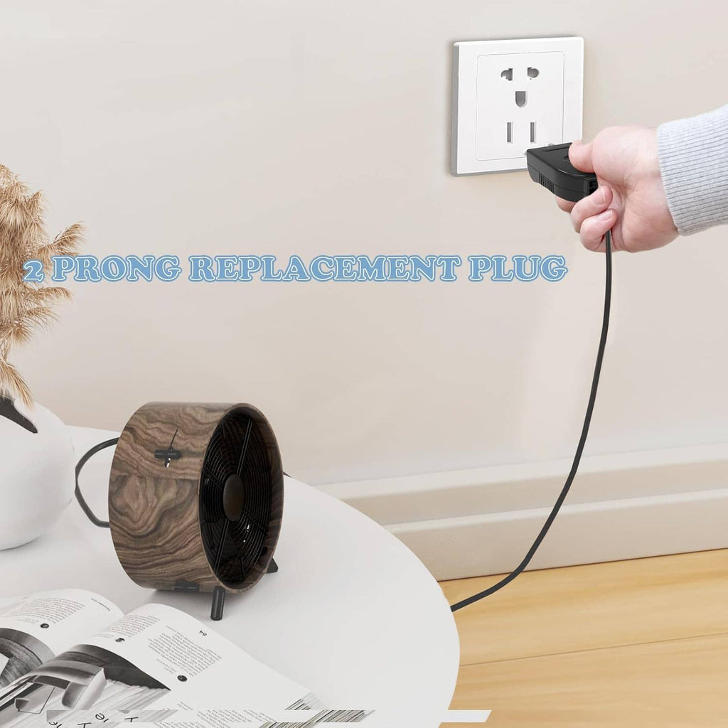 Black 2-prong replacement plug being inserted into a wall outlet socket