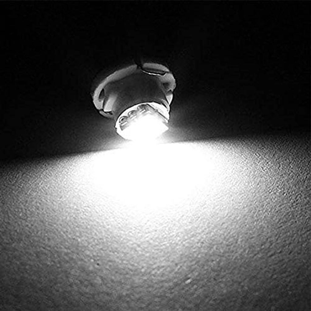 White LED wedge replacement bulb casting a bright beam; black base