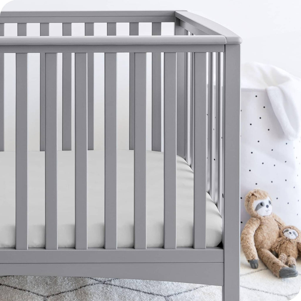 Crib fitted sheet, cloud grey microfiber with smooth fitted panel and elastic edges