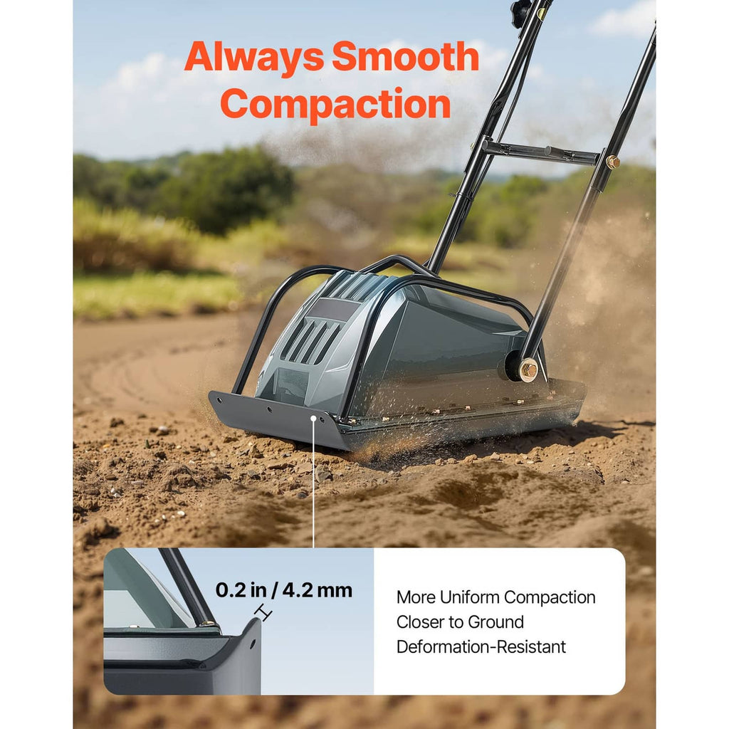Uimoso electric plate compactor compacting on dirt, front view with handle, dark gray