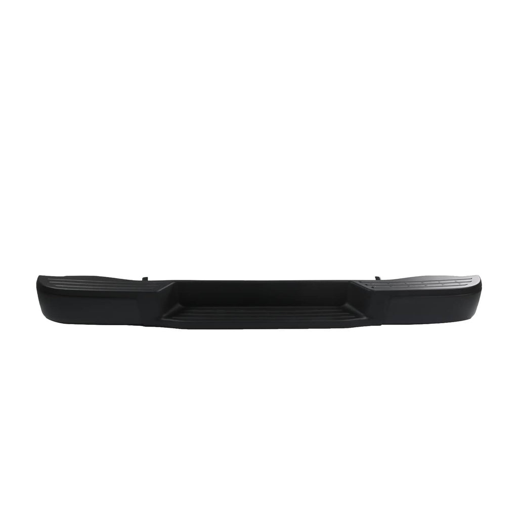 Black rear step bumper cover with center recess and molded tread pattern