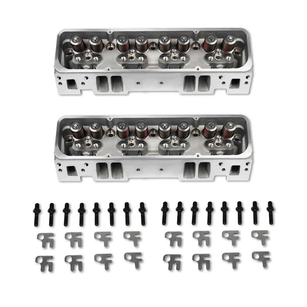 Two aluminum cylinder heads with valve springs, shown with black bolts and clips