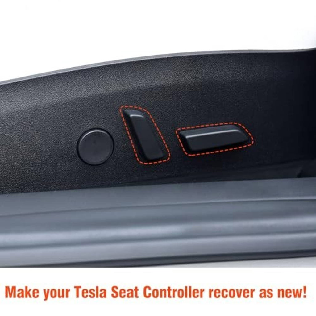 Close-up of installed black seat switch covers with red stitching on the panel.