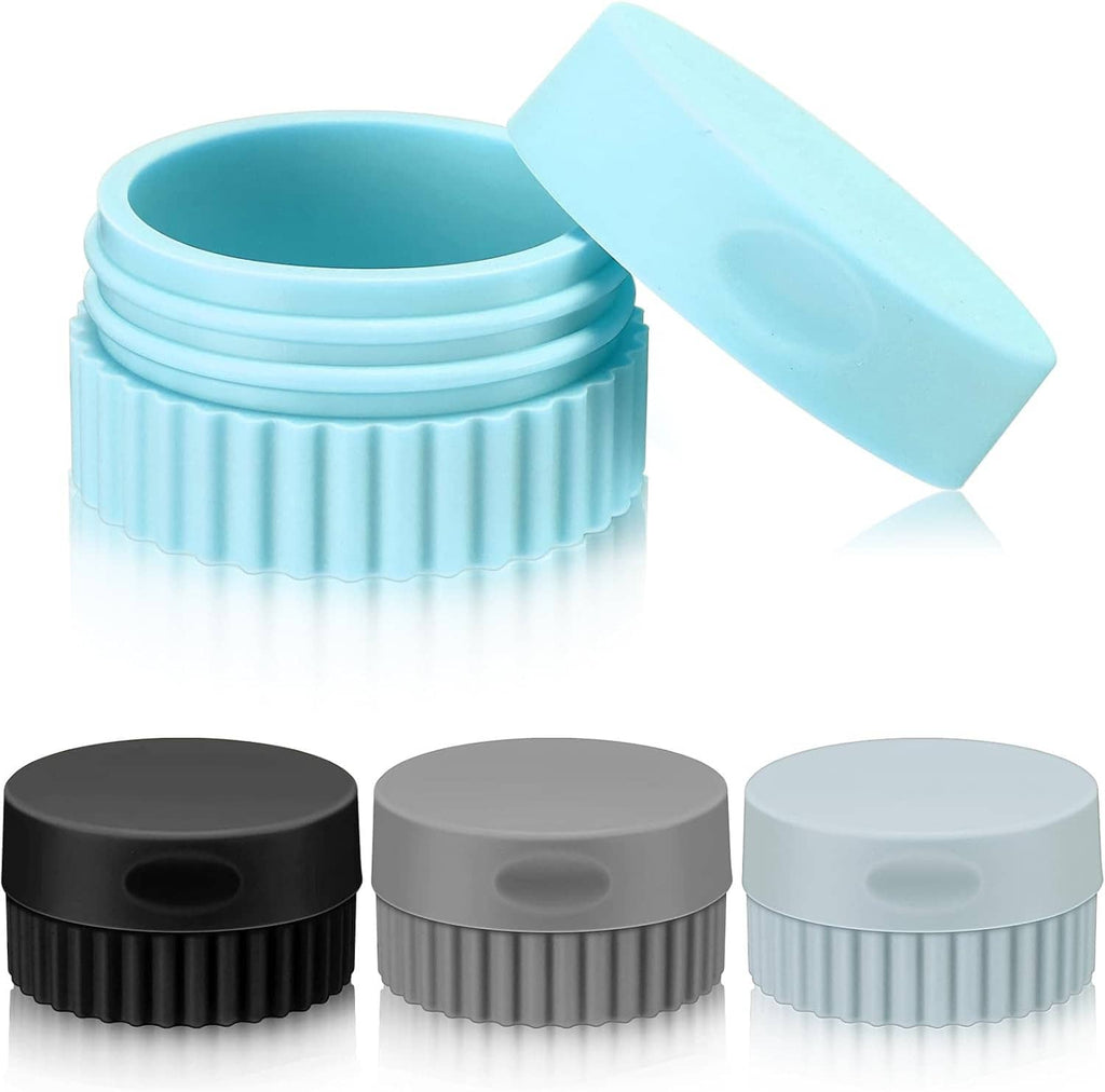 Light blue silicone travel cream jar with matching flip lid, plus three stacked color jars