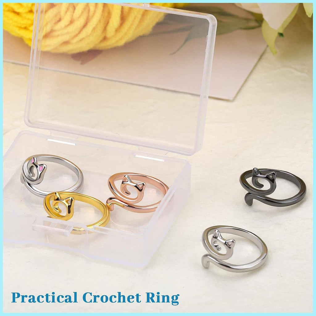 Cat-shaped adjustable crochet tension rings displayed in a clear plastic storage case