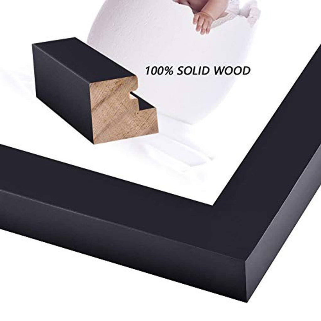 Black solid wood picture frame with visible corner construction and photo insert