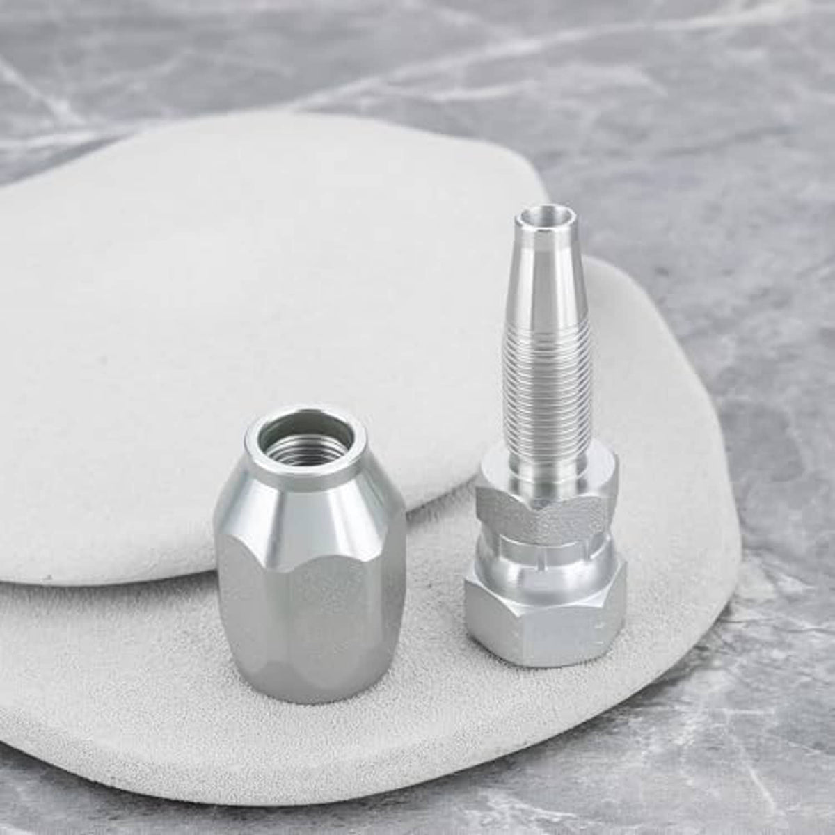 OTOTEC reusable hydraulic hose fittings, two silver hex adapters with tapered threaded ends