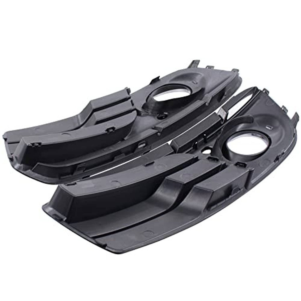 Pair of black ABS fog light grille inserts, rear view with circular cutouts