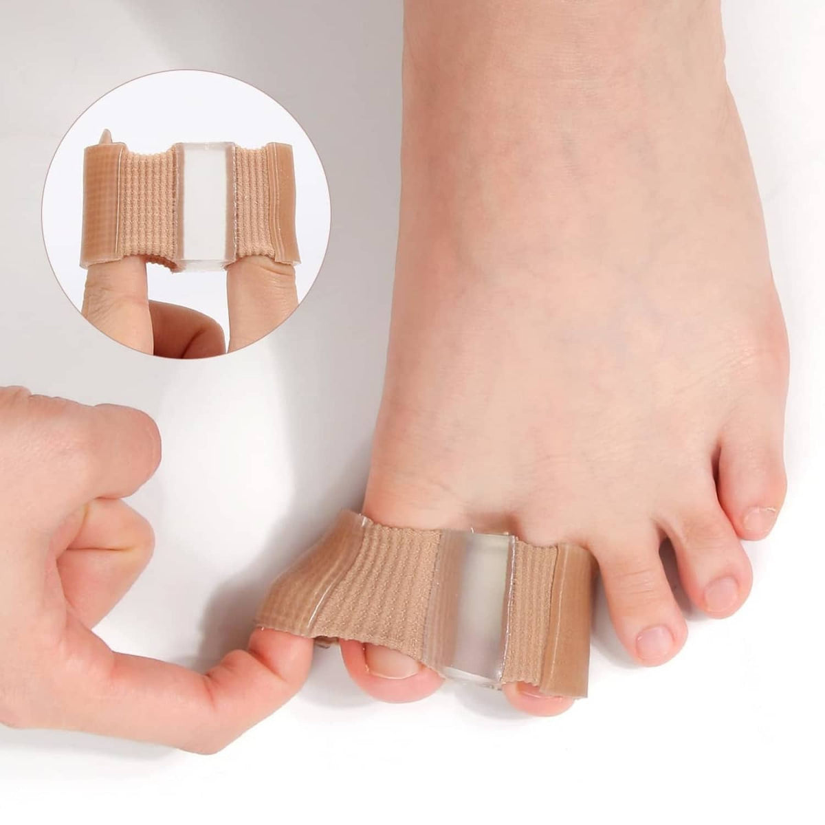 Close-up of tan gel bunion toe separator with dual loops holding toes apart