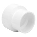White PVC DWV adapter reducer coupling with socket-to-socket ends, close-up angle