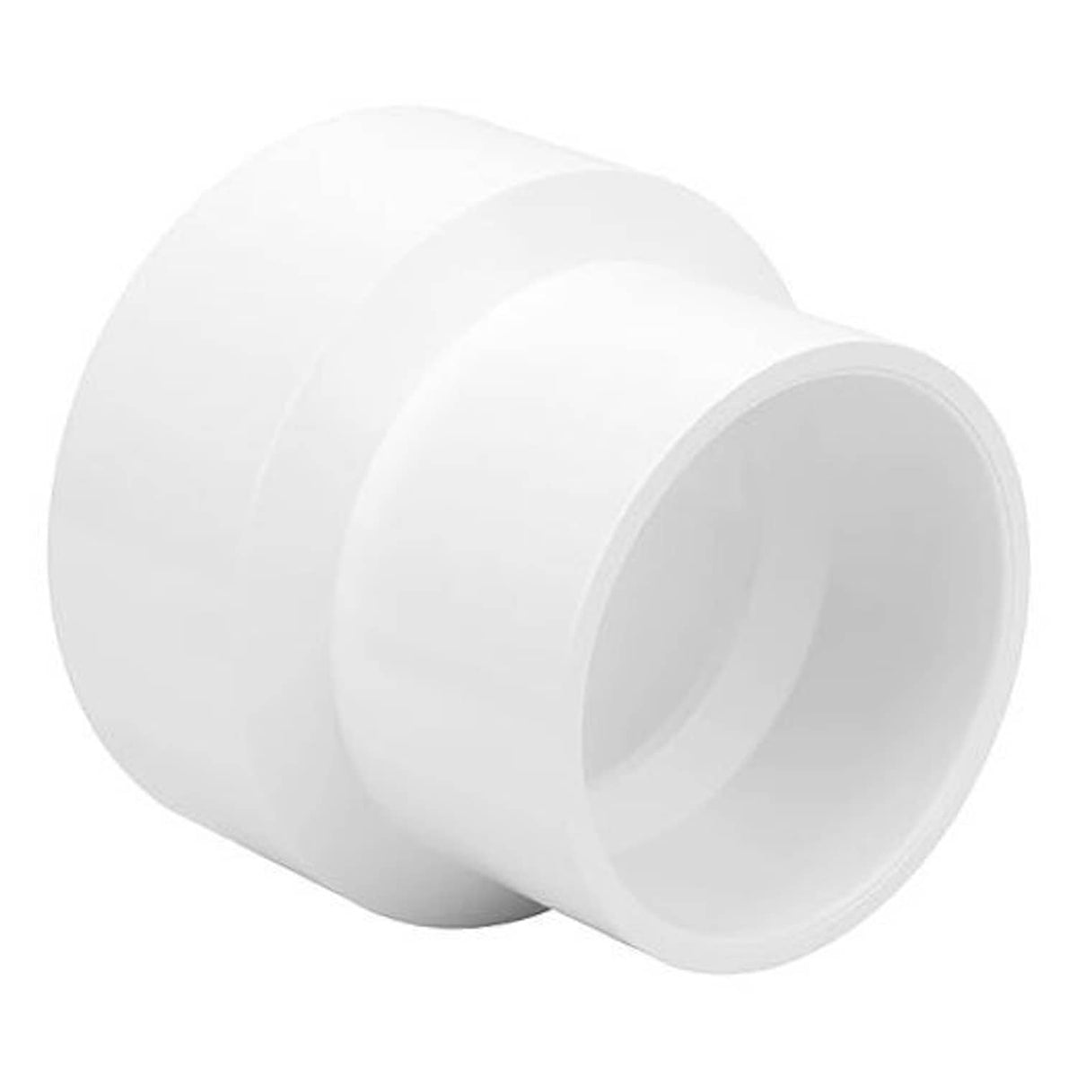 White PVC DWV adapter reducer coupling with socket-to-socket ends, close-up angle