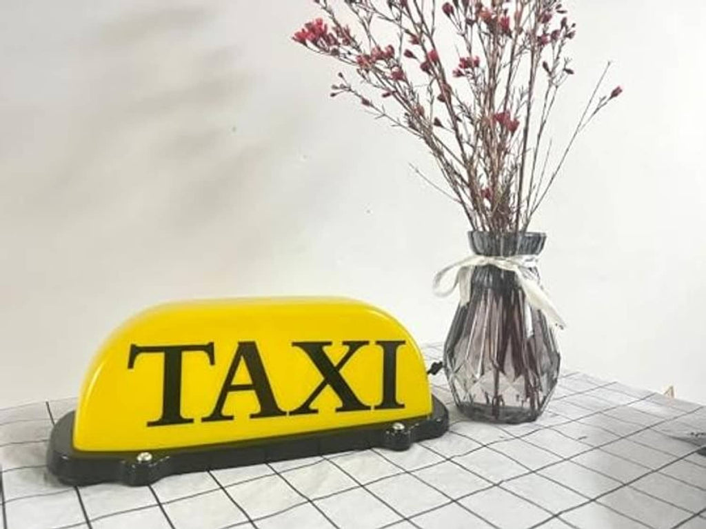 Yellow TAXI dome LED car sign light with dark base