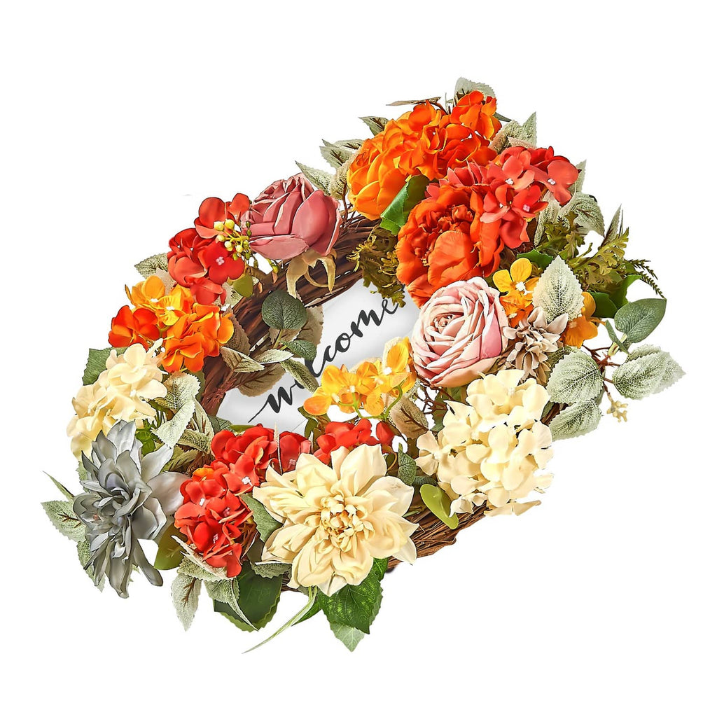 Floral wreath with Welcome sign, viewed from an angle, featuring roses and hydrangeas in warm colors