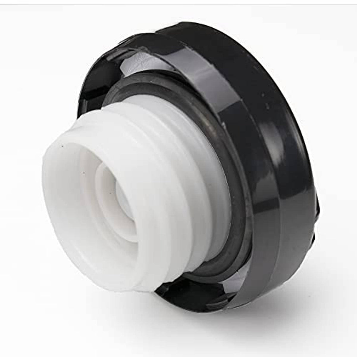 Fuel cap end view showing white gasket ring and black plastic housing