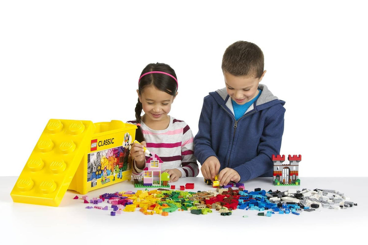 LEGO Classic brick box with multicolor pieces, shown with children building