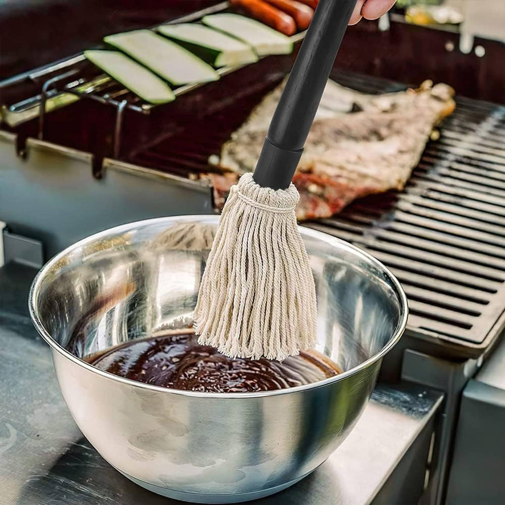Grill basting mop dipping cream cotton tassel brush into basting liquid
