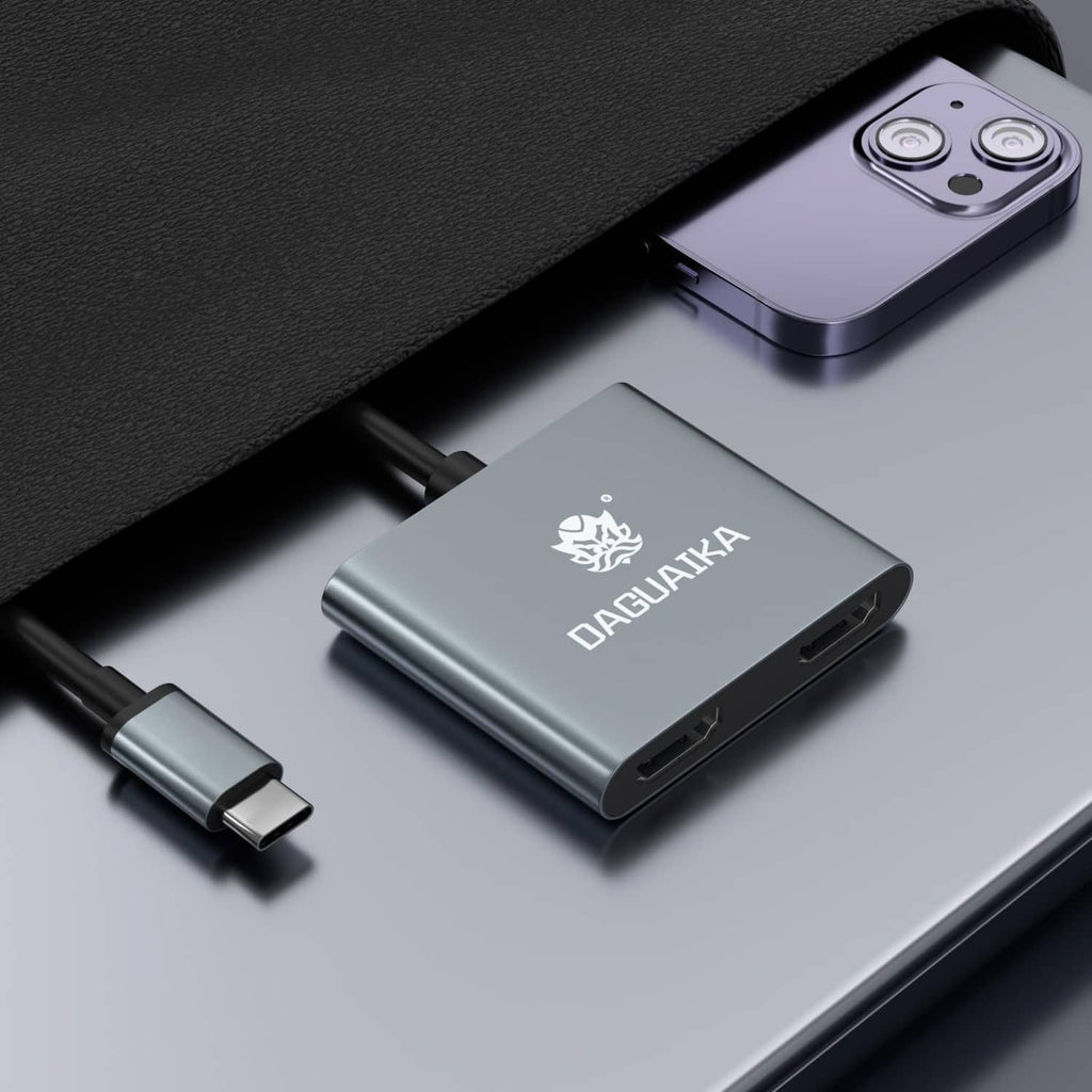 Grey USB-C dual HDMI adapter close-up with HDMI and USB-C ports visible