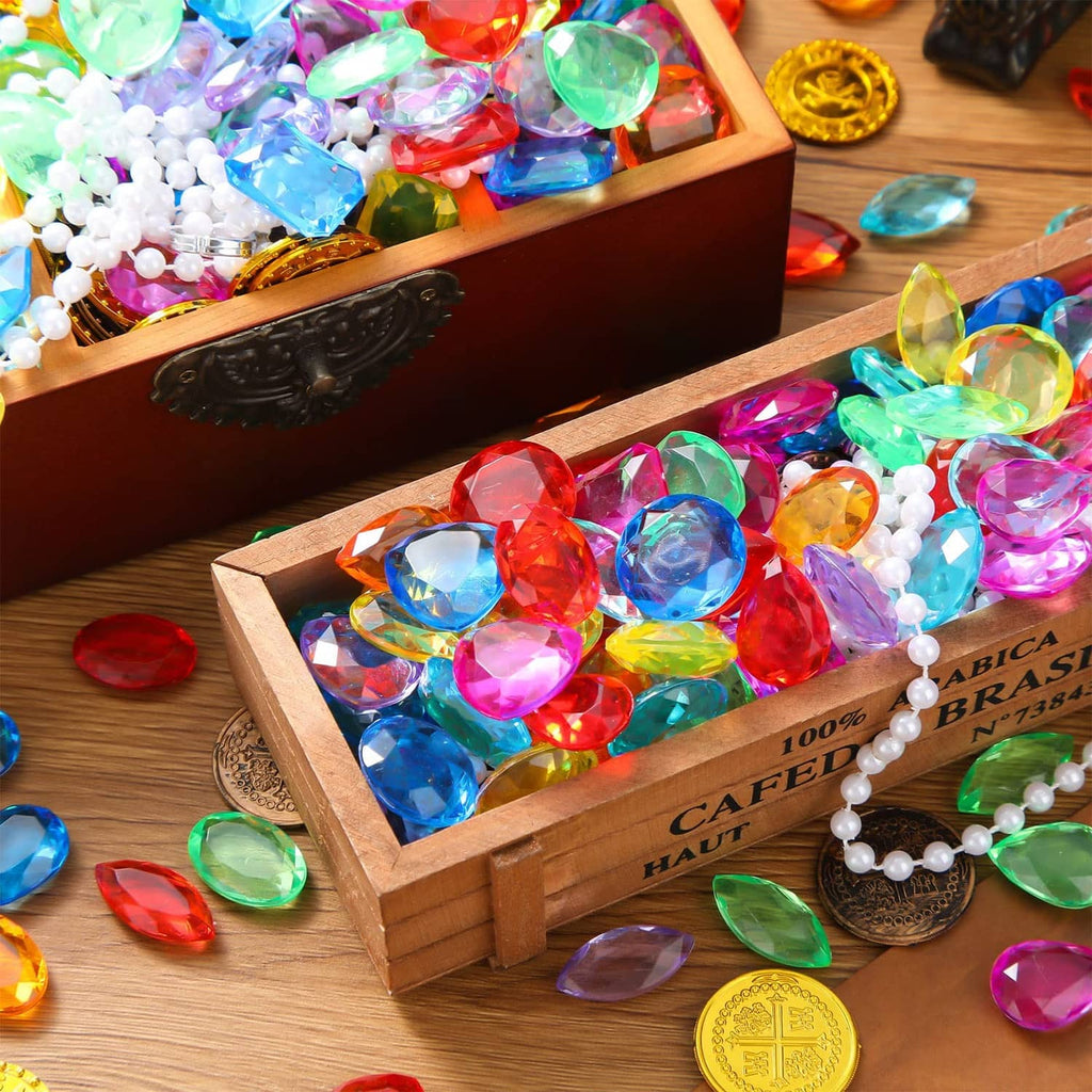 Wooden treasure boxes of multicolor faceted acrylic gems with white bead strands