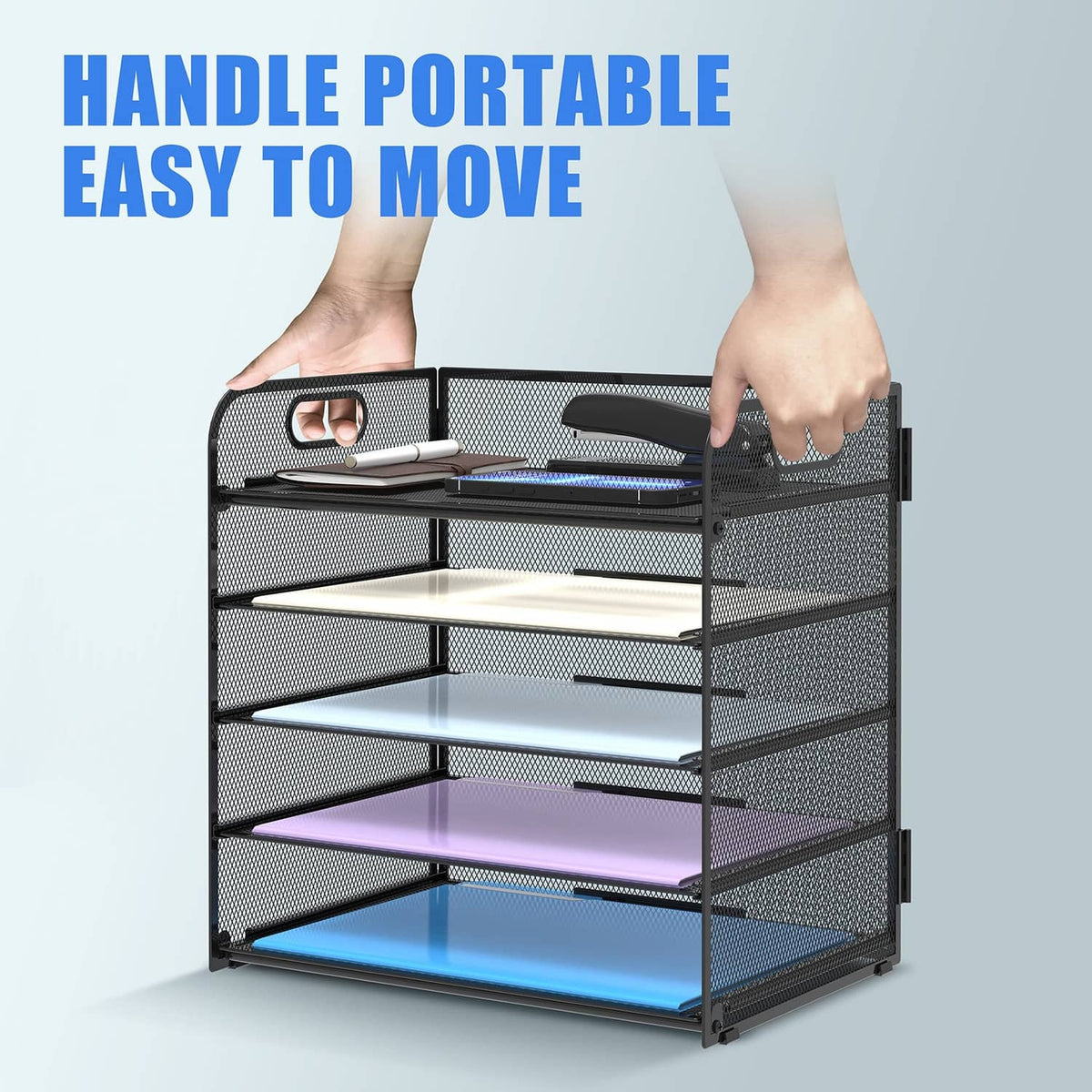 Portable black mesh 5-tier desk organizer tray with top handle, being lifted.