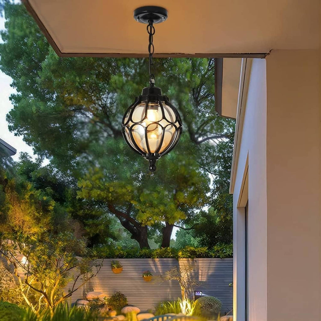Black outdoor porch pendant light with glass lantern shade and hanging chain