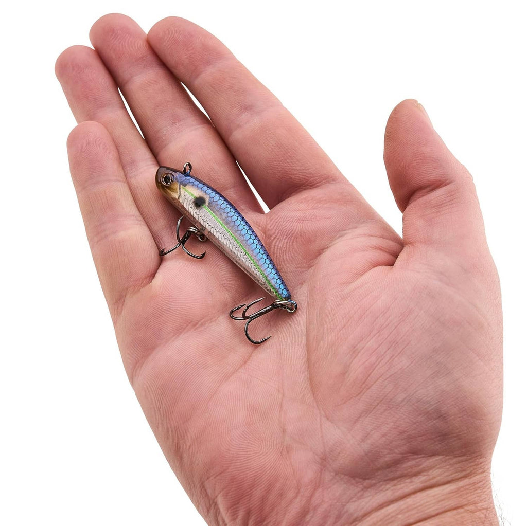 Blue smelt crankbait held in open hand, treble hooks visible