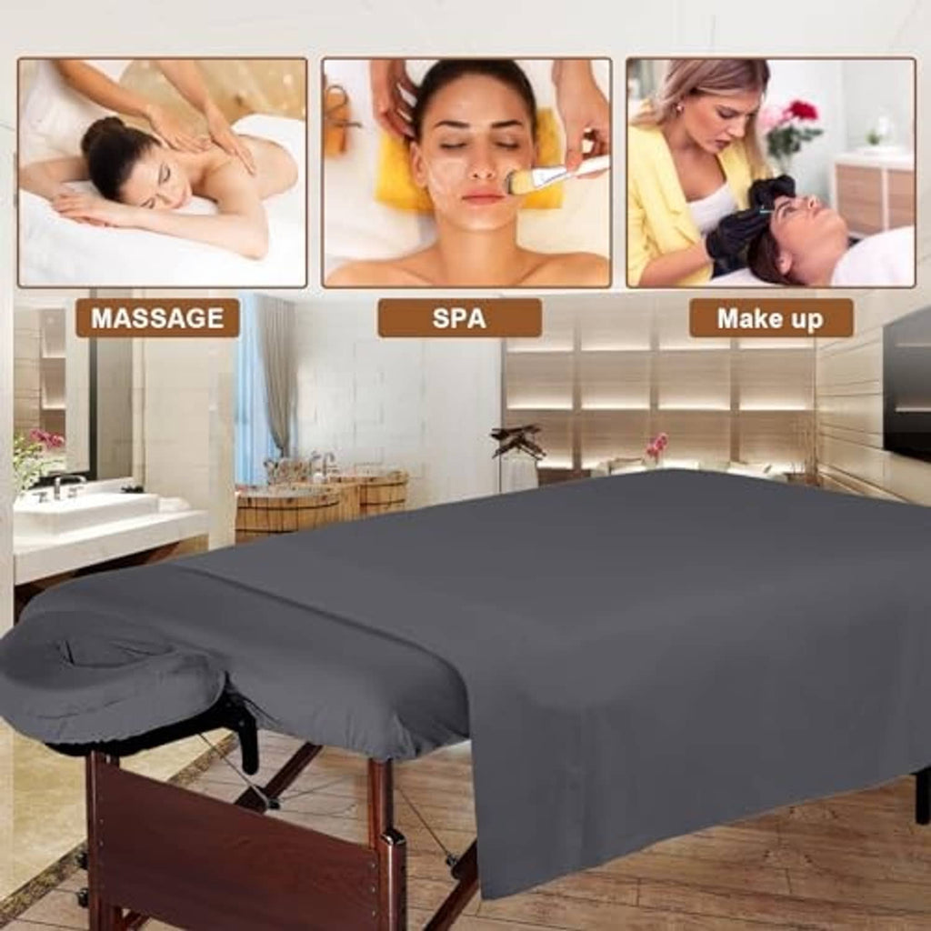 Gray fitted massage table cover with rounded face rest opening on a massage table