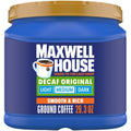 Maxwell House Decaf Original medium roast ground coffee jar, blue with gold lid.