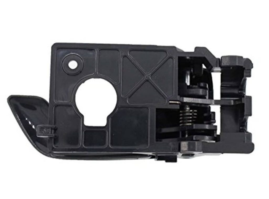 Black inside door handle panel with circular hole and latch mechanism