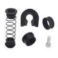 Black gearbox repair kit components: spring, U-shaped bushing, sleeve, and screw