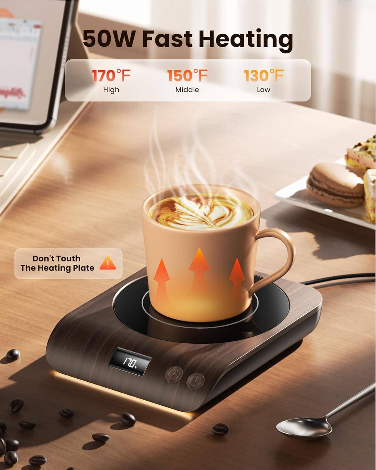 Coffee mug warmer heating a latte cup on a dark brown base with glowing ring