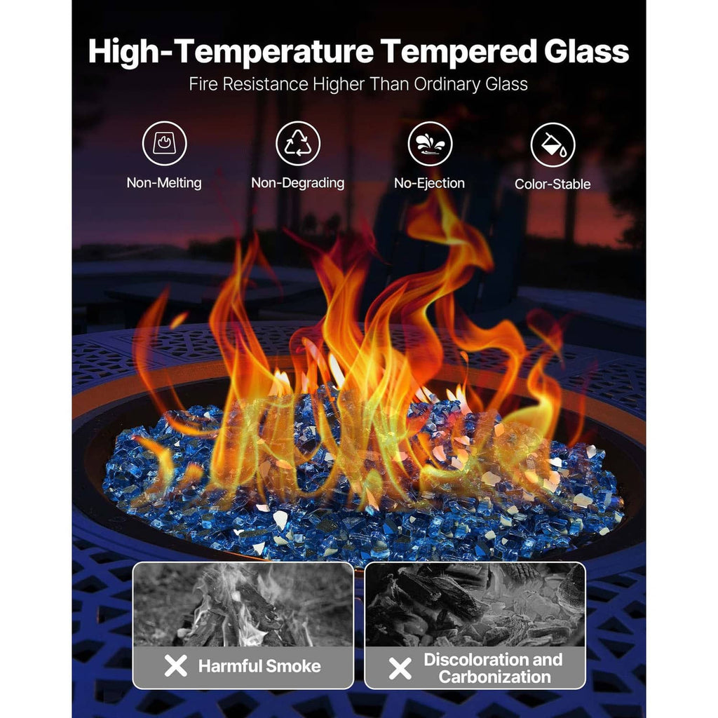 Pacific blue crushed glass fire pit rocks with visible flames in a round pit.