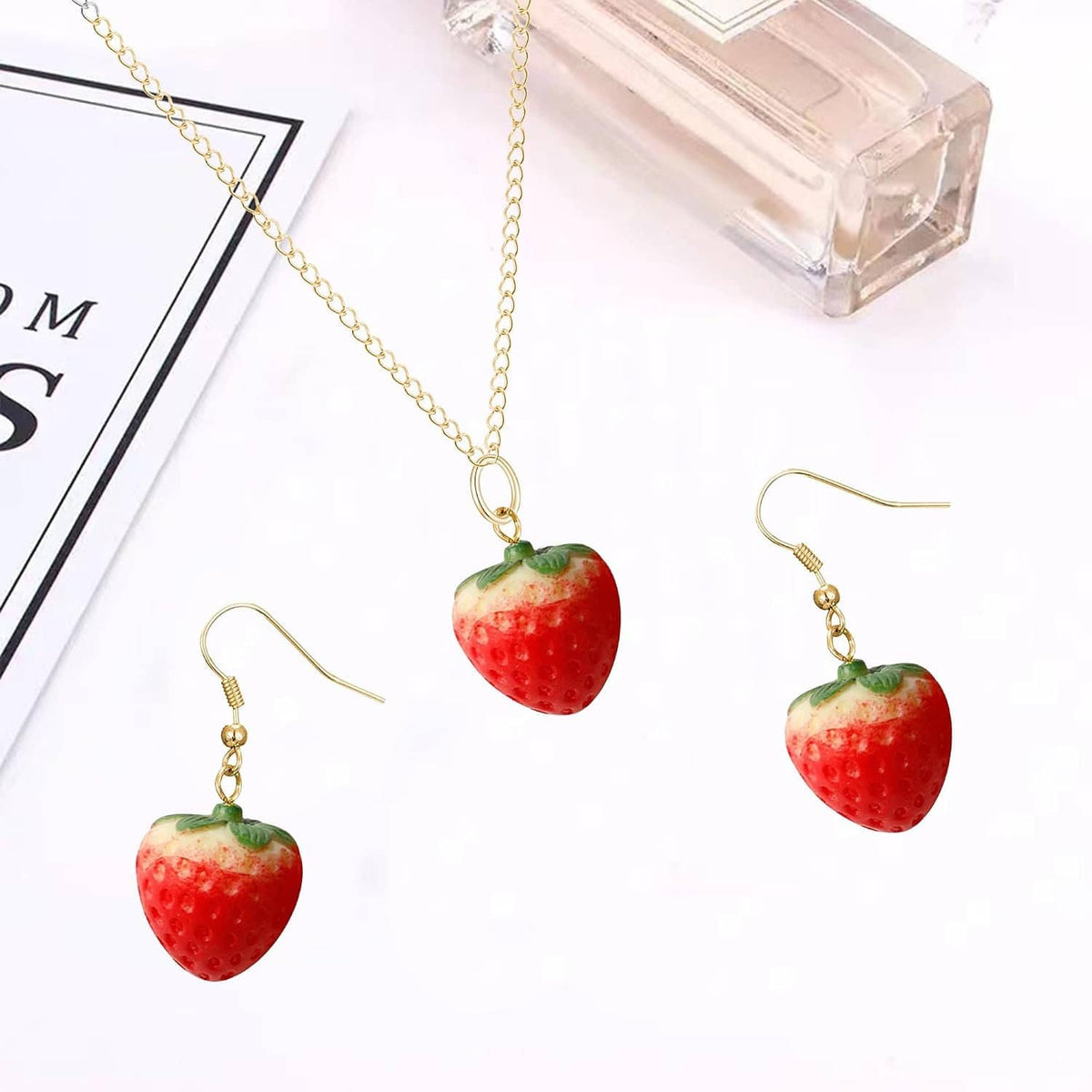 Strawberry jewelry set: gold-tone necklace with strawberry pendant and drop earrings
