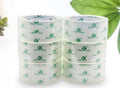 Clear packing tape refill roll with green printed branding, crystal clear film