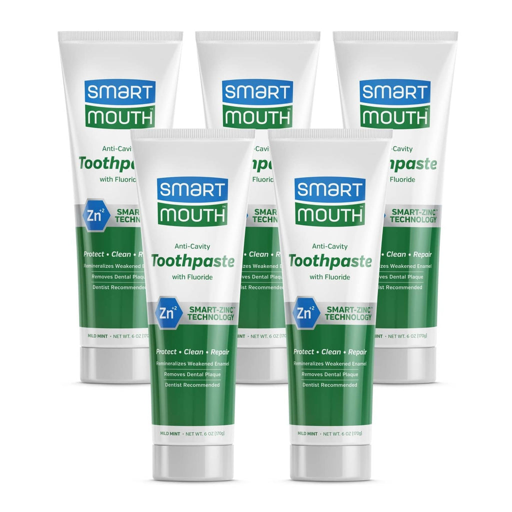 Multiple fluoride mint toothpaste tubes, green-and-white Smart Mouth packaging