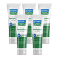 Multiple fluoride mint toothpaste tubes, green-and-white Smart Mouth packaging
