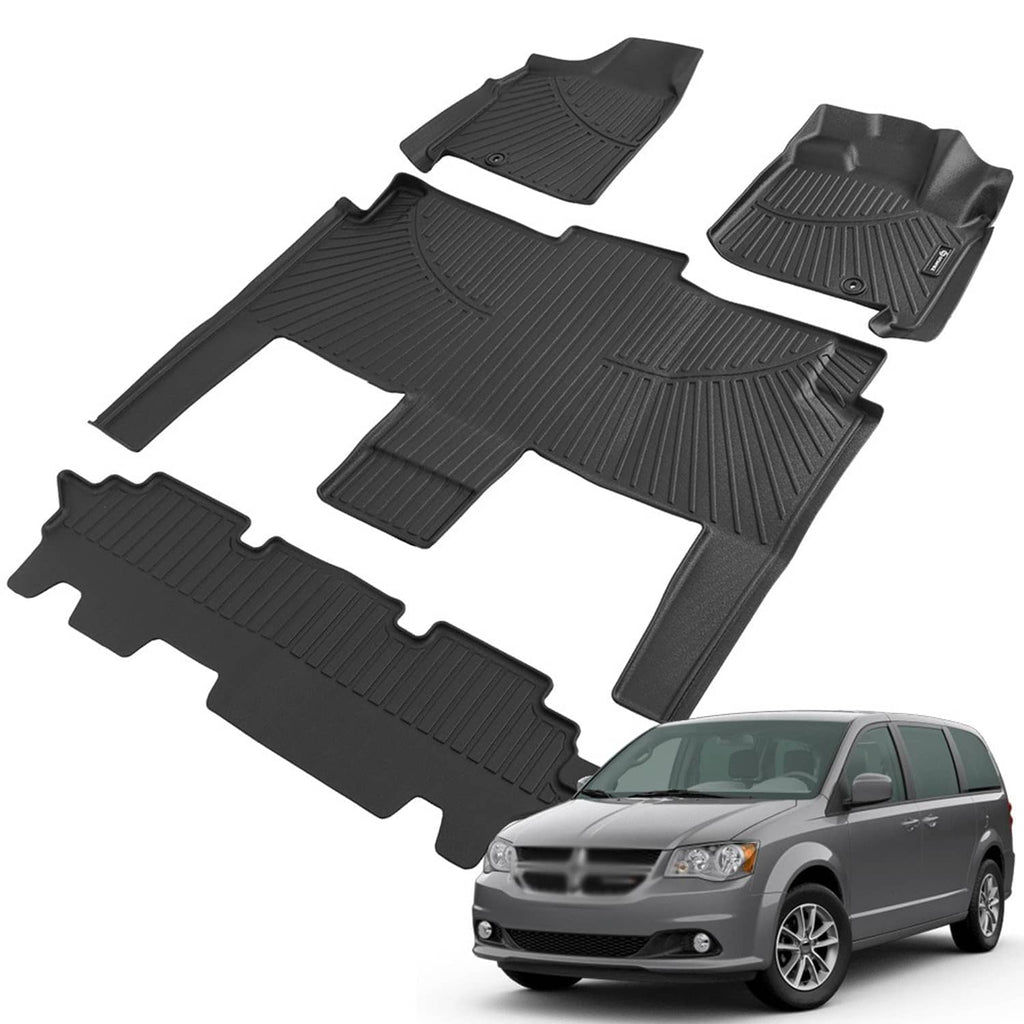 All-weather rubber floor liner set with ridged tread pattern and vehicle-fit cutouts, dark