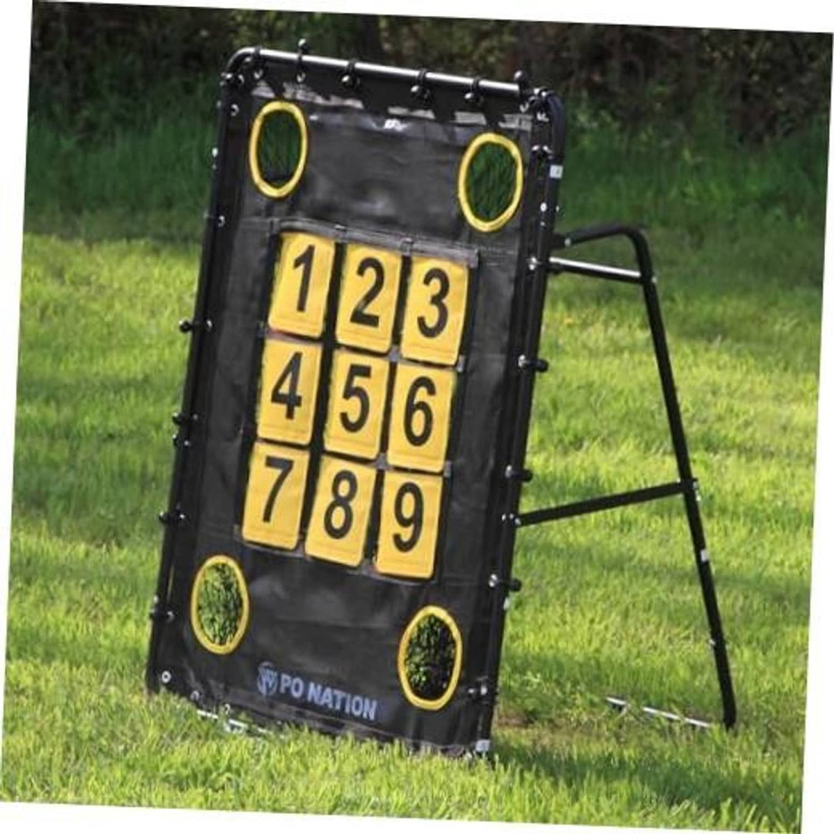 Outdoor baseball pitching target net on stand with yellow 1–9 strike zone squares