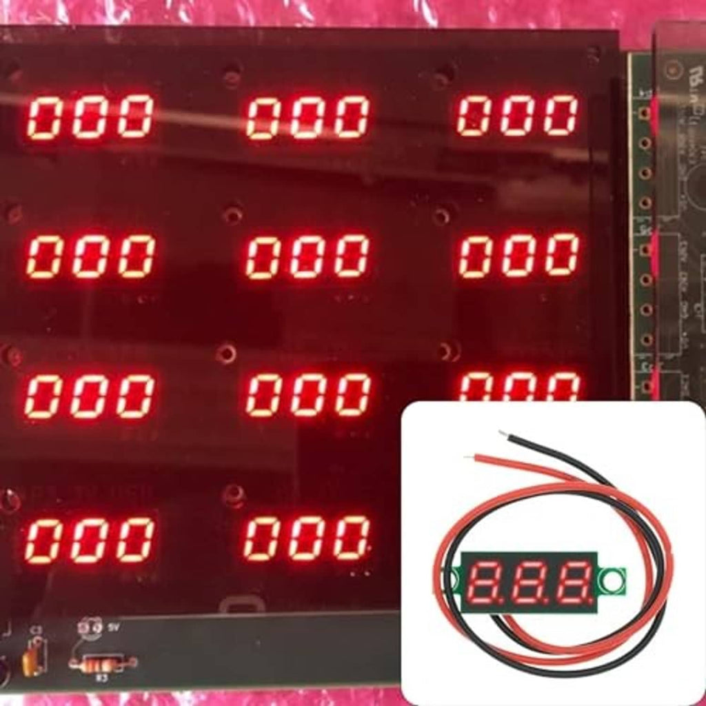 Red LED voltmeter display panel showing 0.00 values with wire module