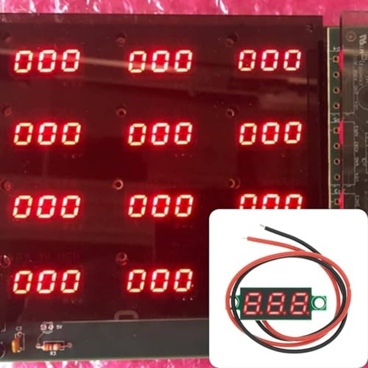 Red LED voltmeter display panel showing 0.00 values with wire module