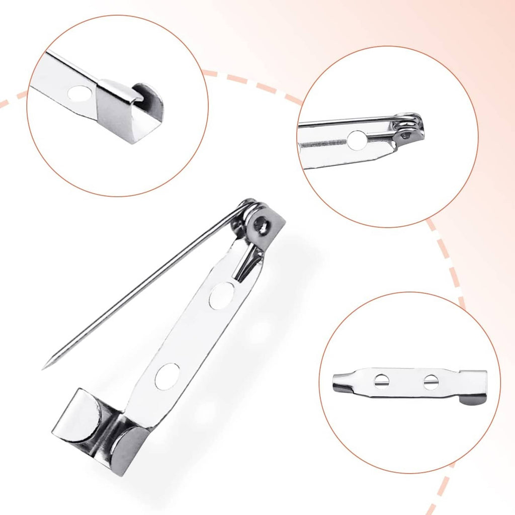 Silver bar pin brooch clasp with long needle prong and hinged back, close-up