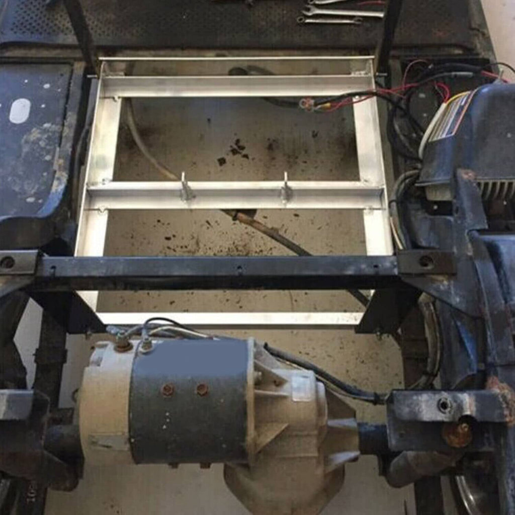 Aluminum 36V battery tray rack with support rails, open view inside the cart