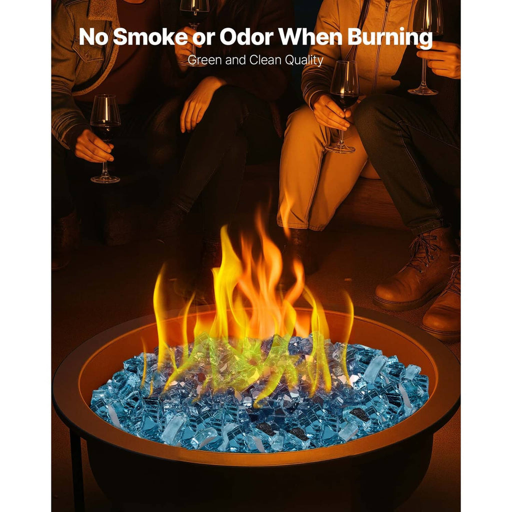Aqua blue fire pit glass in a round bowl, surrounded by burning flames