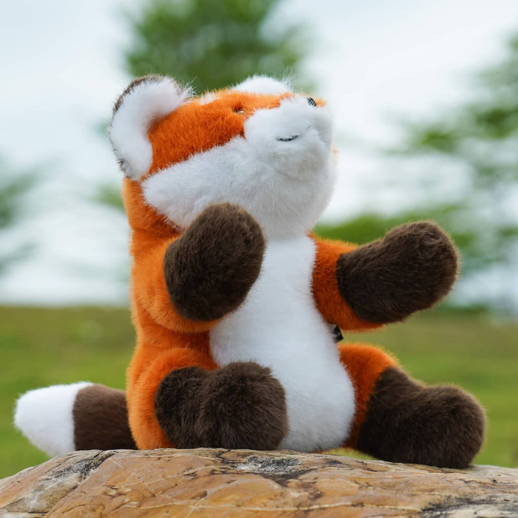 Fox plush driver headcover in a seated pose with brown paws forward