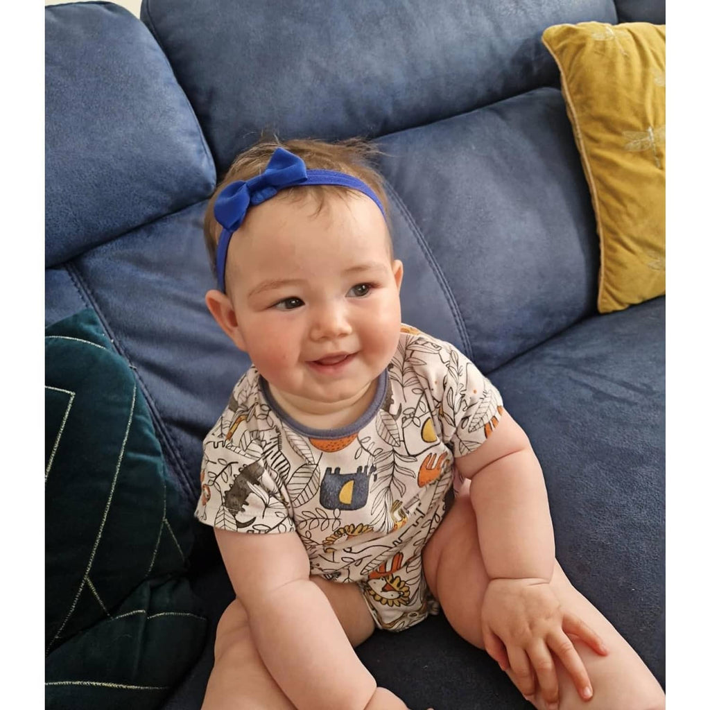 Baby girl headband with blue bow and smooth fabric band