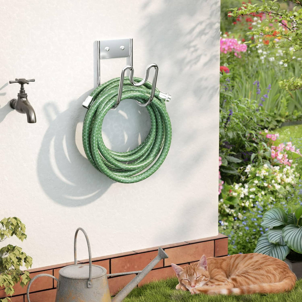 Stainless steel hose holder with mounting plate holding a coiled green garden hose