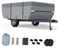 Gray pop-up camper trailer cover with side straps and elastic hem