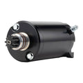 Starter motor assembly with black housing, mounting bolts, and front pinion