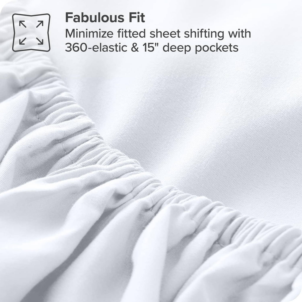 White fitted sheet fabric close-up with gathered elastic edge detail